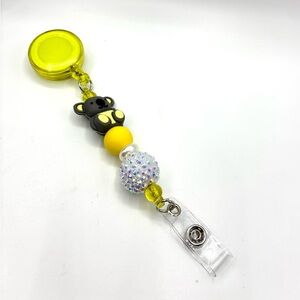 Yellow and Gray Koala Badge Reel
